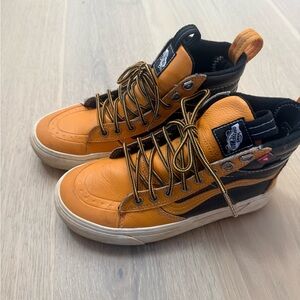Vans Yellow and Black High-Top rugged Sneakers with Classic Design